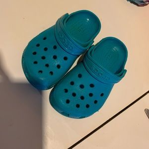 Teal Crocs size toddler 9c